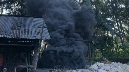 Plastics being burned in a village in Indonesia.