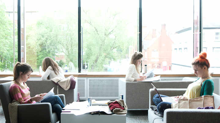 Students studying in a break-out area.