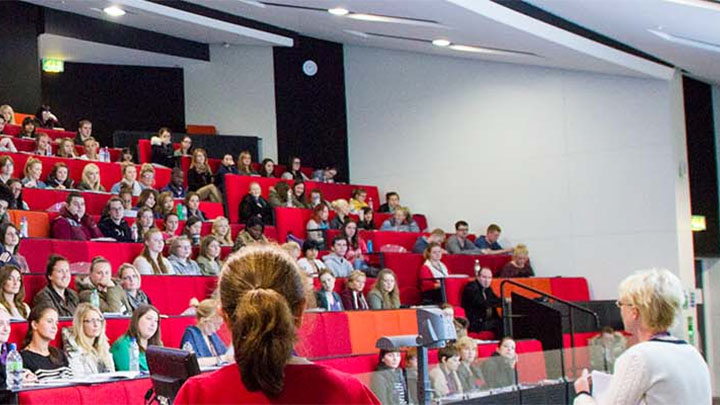 Students listening to a lecture in one of the Faculty's lecture theatres.