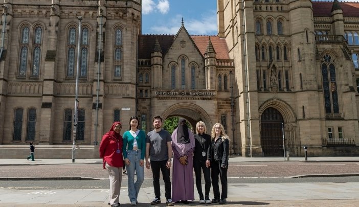 A group of students in front of Whitworth Arch